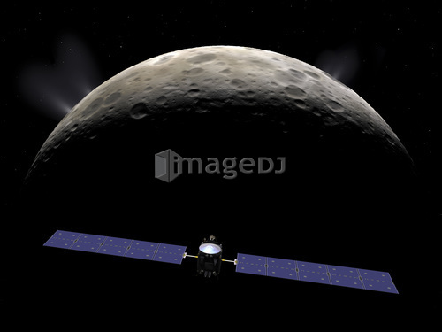 Artist's concept of the Dawn spacecraft entering orbit around Ceres.