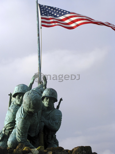 A close up of the Iwo Jima bronze statue showing detail of the sculpture.