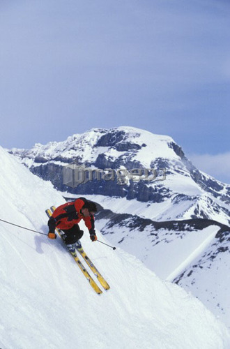 Young man skiing at Lake Louise Resort, Alberta, Canada.