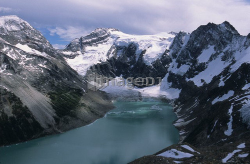 Alpine lake with glacier and mountains surrounding, Lake of the Hanging Glaciers, East Kootenays, B.C.
