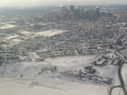 Calgary downtown in winter, as seen from airplane window.