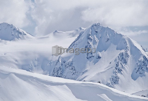 Fissile Mountain, daytime, covered in winter snow, Whistler, B.C.