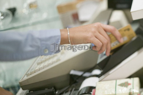 Swiping credit/debit card, Vancouver, B.C.