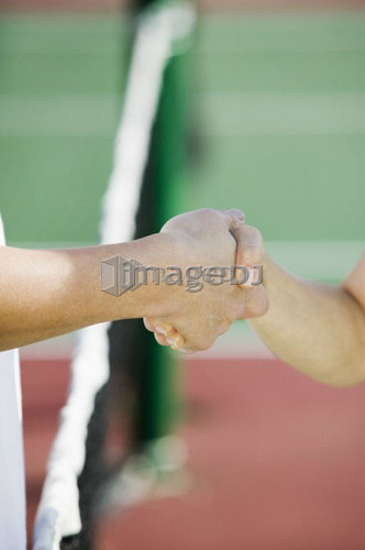 Senior Asian couple and tennis, B.C.