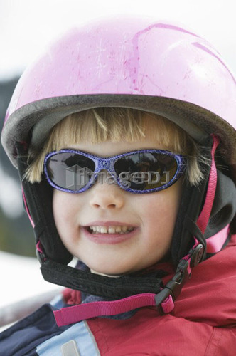 4 Year Old Girl Wearing a Ski Helmet, North Vancouver, B.C.