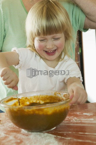 Young Girl Helping to Make a Pumpkin Pie, Vancouver, B.C.