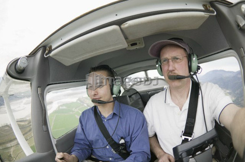 Pilots in a Cessna 172 In Flight, Vancouver, B.C.