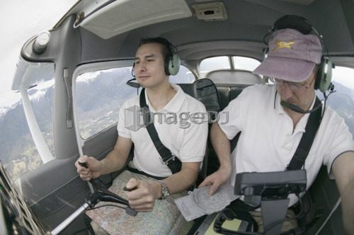Pilots in a Cessna 172 In Flight, Vancouver, B.C.