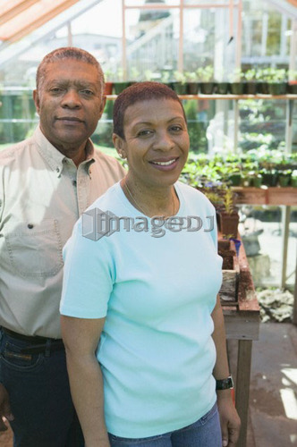 Senior African America Couple in Their Greenhouse, B.C.