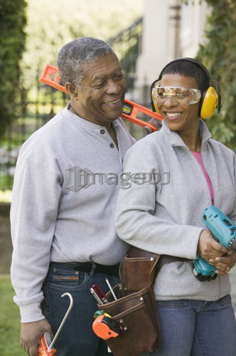 African American couple doing home improvement, B.C.