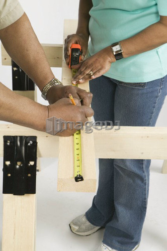 African American Couple Doing Home Improvement, B.C.