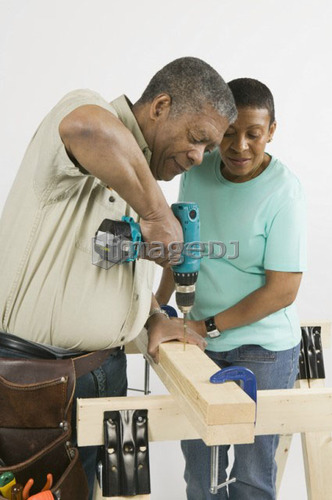 African American Couple Doing Home Improvement, B.C.