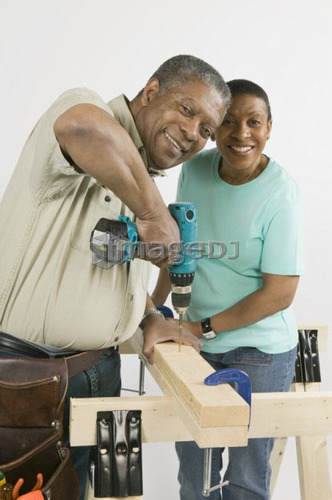 African American Couple Doing Home Improvement, B.C.