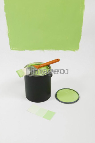 Paint brush, can of paint, colour sample