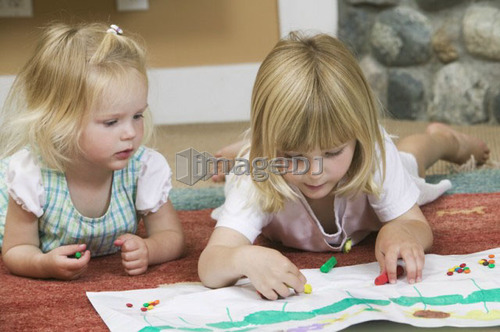 3 and 5 year old sister doing artwork, B.C.