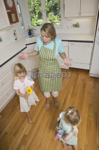 Mom and playful girls, B.C.