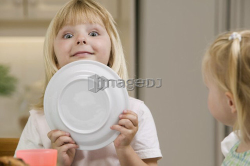 5 year old playing around during breakfast, B.C.