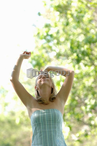 Young blonde female in park, Regina, Saskatchewan