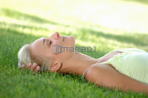 Young blonde female in park, Regina, Saskatchewan