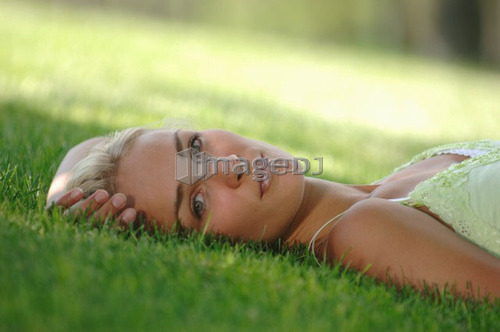 Young blonde female in park, Regina, Saskatchewan