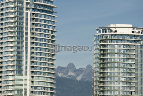 Skyscrapers occupy the Vancouver skyline.  Housing prices are at an all-time high