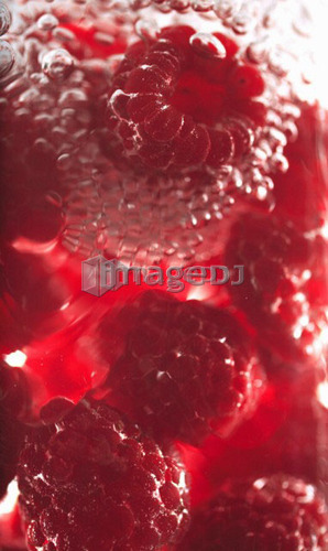 Raspberries floating in water