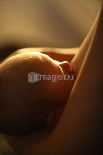 Mother breastfeeding child, Saskatchewan