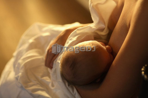Mother breastfeeding child, Saskatchewan