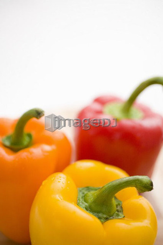 Yellow, orange and red peppers