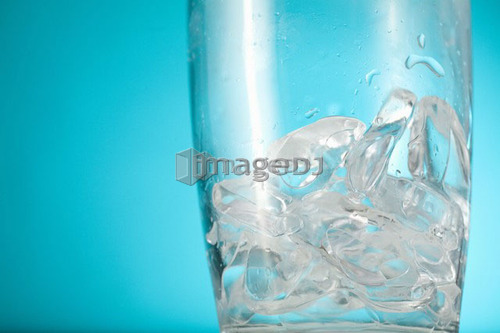 Ice chips in bottom of clear glass