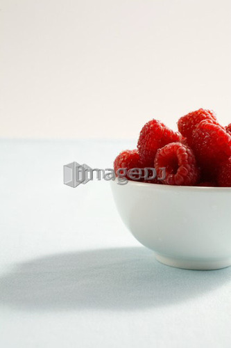 side view, bowl of raspberries