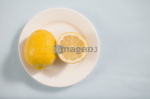 Lemons on white plate