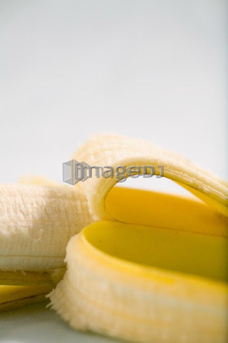 Partly peeled banana