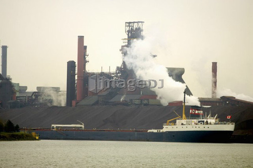 Ship at a steel manufacturing plant, Hamilton, Ontario.
