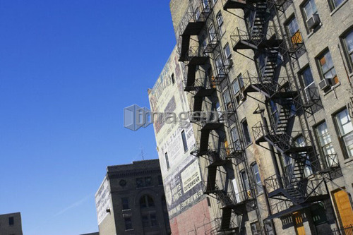 Fire escape staircases on an old run down apartment building, Winnipeg, Manitoba.