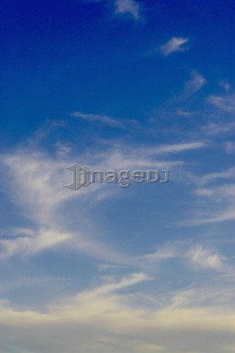 Deep blue sky scape with wispy clouds, Drumbo, Ontario