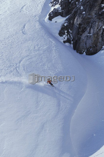 Young man skiing on ungroomed slope near Fortress Mountain, Alberta, Canada.