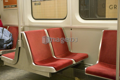 Empty seats, interior of subway car