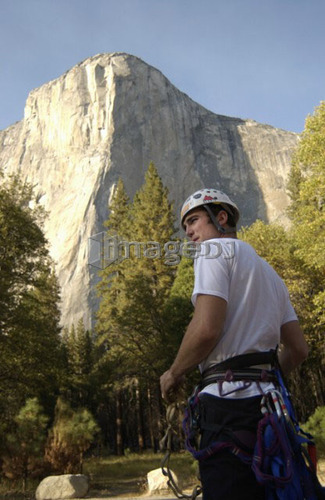 Man (20-25) standing in front of El Capitan in Yosemite National Park, USA