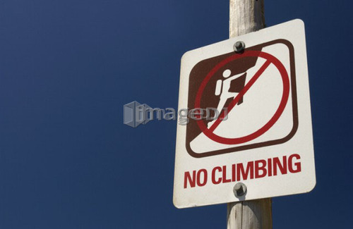 No Climbing sign against blue sky background, Oregon Dunes National Recreation Area