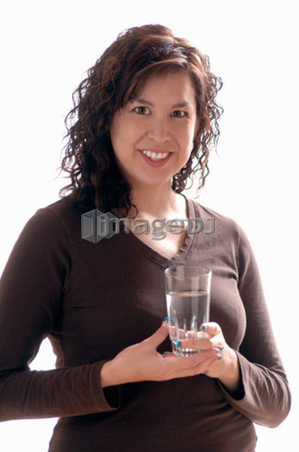 Young girl w/water glass, Regina, Saskatchewan