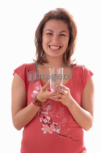 Young girl w/water glass, Regina, Saskatchewan