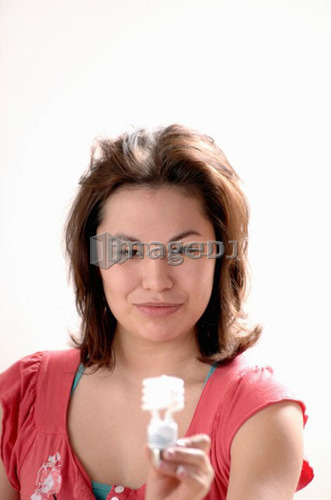 Young girl w/Light bulb, Regina, Saskatchewan