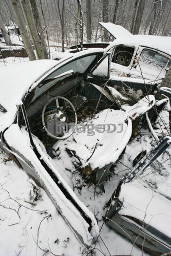 View of automobile in junkyard. Montérégie region, Quebec