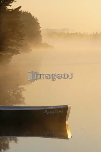 Boat and mist at Étang-à-la-Truite (Trout pond), Gaspesie, Quebec