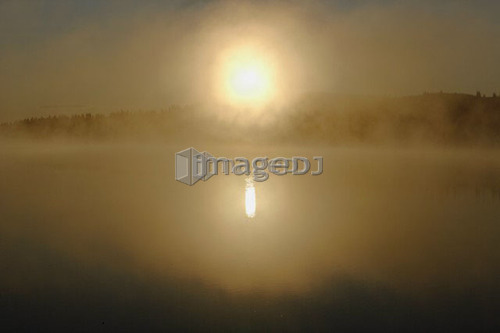 Mist and sunrise at Étang-à-la-Truite (Trout pond), Gaspesie, Quebec