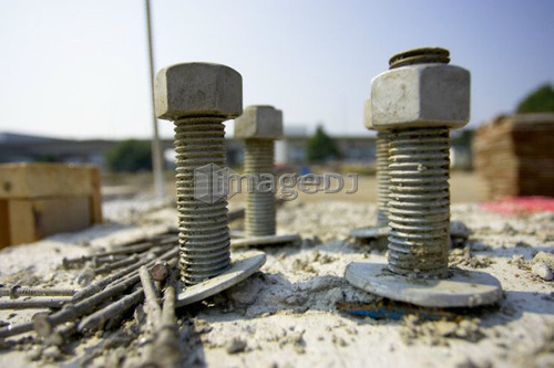 Nut, bolt, and washers embedded in concrete; Canada, Ontario, Hamilton (Composting Facility)