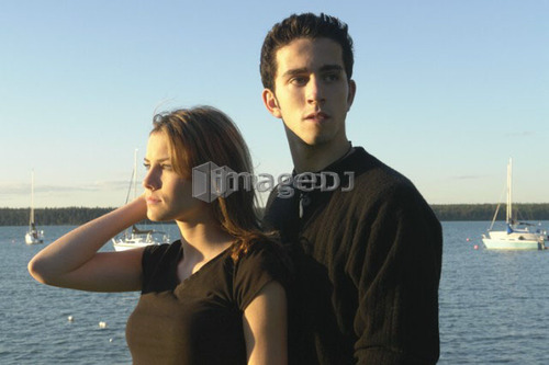 Teenage couple Clear Lake; Canada, Manitoba, Riding Mountain National Park