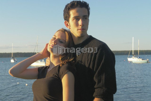Teenage couple Clear Lake; Canada, Manitoba, Riding Mountain National Park