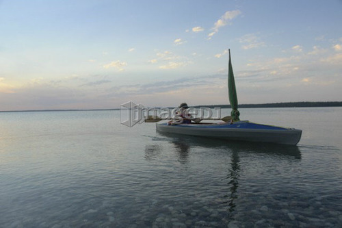 Woman in kayak Clear Lake Riding Mt. Nat. Park; Canada, Manitoba, Riding Mountain National Park